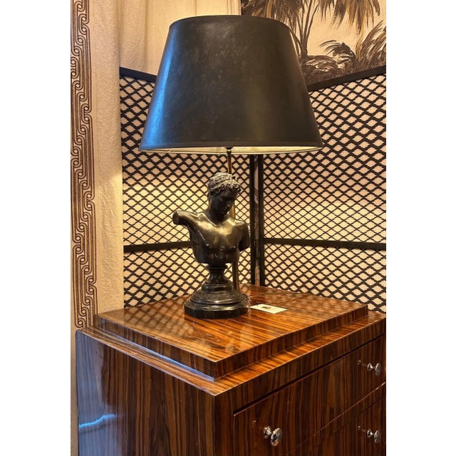 A handsome distinguished bronze bust lamp! Its all-black monochromatic palette is modern, chic and sexy. A solid bronze...