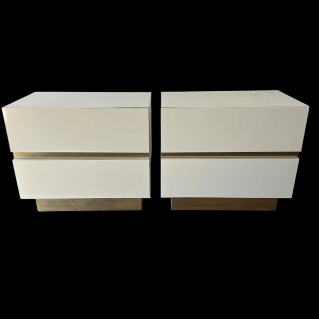 1980’s post modern, modern nightstands. Formica with mirrored (gold) brass plating. Each measures 24.75x15x22 tall. Brass...