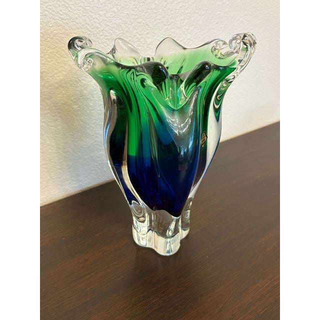 The permutation of the blues and green are so vivid. It is indeed heavy art glass but there is a style represented by the...
