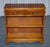 This elegant vintage dwarf bookcase is crafted in beautifully figured burr yew wood, showcasing rich grain patterns and...