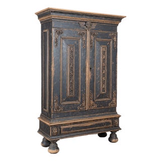 Late 18th Century Swedish Black Painted Oak Armoire With Carved Putti and Lion Heads For Sale