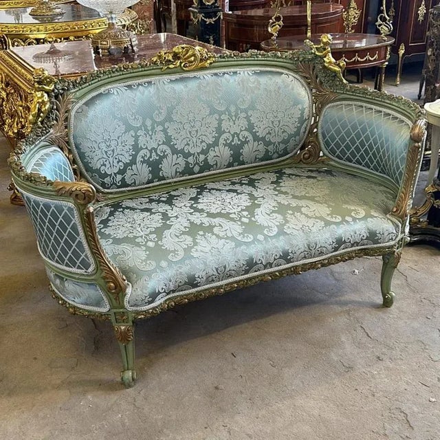 Beautiful sofa with gold upholstery and gold details. Stunning details. Unique and gorgeous fabric upholstery. Elegance...