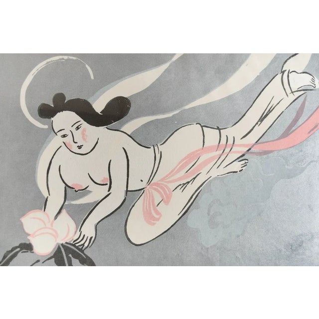 An original color hand-pulled silkscreen of a woman/goddess holding a flower in mid-air by renowned Japanese-born American...