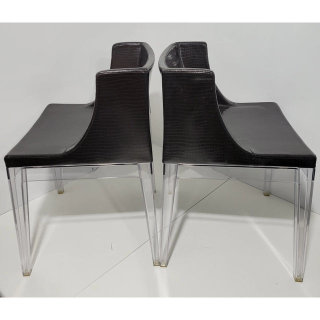 Nice pair of Modern Style Kartell Mademoiselle Chairs. Designed by Iconic Contemporary designer, Phillip Starck. Made with...