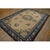 Antique Chinese Knotted Rug, Circa Date: 1900s. This exquisite example of early 20th-century weaving presents a striking...