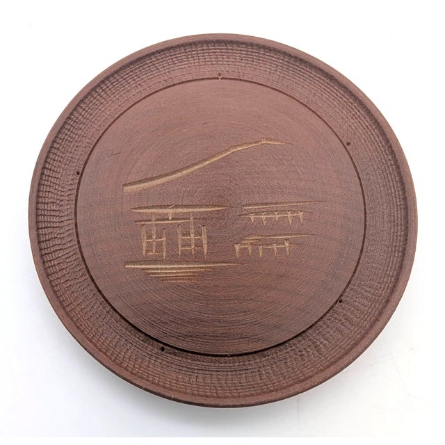 Offered is a set of 7 carved and etched Teak wood coasters that come with a round lidded box. Made in Japan some time...