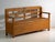 This antique painted storage bench in pine wood is a bench with storage, a lift-up seat and a lattice back, with armrests....