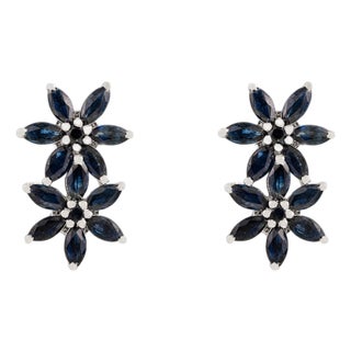 A Pair of Vintage-Inspired Solid Silver Blue Sapphire Floral Stud Earrings For Sale