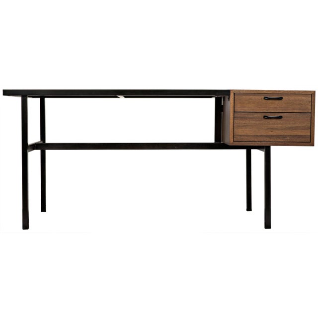 Two walnut drawers and interest and practicality to this pared down desk. The essence of simplicity, it has been...