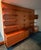 ​A rare 4-bay Cado Royal System wall unit, designed by master architect Poul Cadovius and manufactured in Denmark. This...