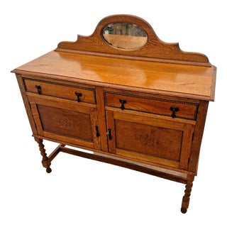 Early 20th Century English Jacobean Revival Carved Oak Buffet, Credenza Barley Twist Legs, Mirror For Sale