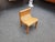 Likely a very rare and beautifully designed solid wood children's chair. Handcrafted. Eighteen wooden slats form the seat...