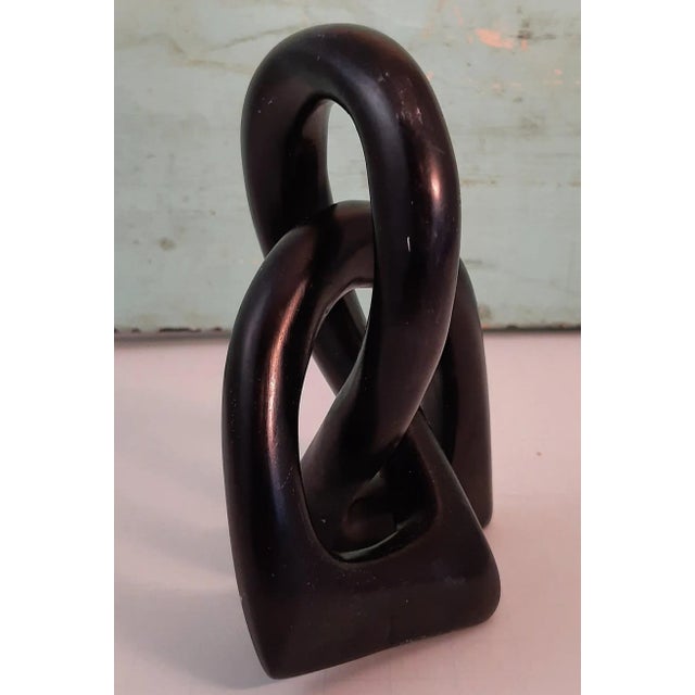 Vintage Black Knot Rings Sculpture. Inter-locking knot art piece. This would be amazing in any type of decor. Solid Black...