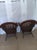 Dark brown wicker rattan armchairs high rounded backs and open side cutouts set of 2 Style: Coastal Color: Brown...