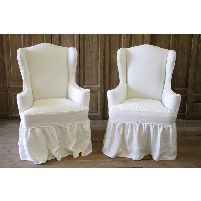 Modern White Linen Slip Covered Wingback Chairs With Ruffle Skirt A Pair