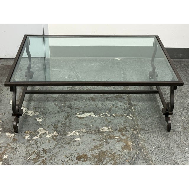 Design Plus Gallery presents the Alpine Lodge Collection Glass Coffee Table by Ralph Lauren Home. A rectangular glass top...