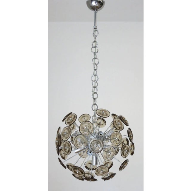 Original vintage Sputnik chandelier with smoky glass disks on chrome frame. Designed by Cristal Arte, c. 1960's. Made in...