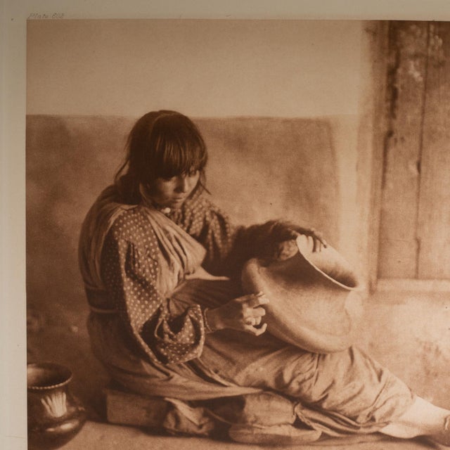 ABOUT Edward S. Curtis (1868 - 1952) The Potter Santa Clara. Photogravure on handmade Dutch "Van Gelder" paper stock....