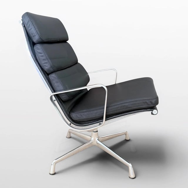 An iconic and exceptionally comfortable Eames Soft Pad Lounge Chair & Ottoman, originally designed by Charles & Ray Eames...