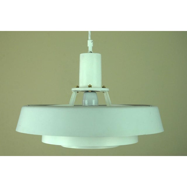 A rare and unusual pendant lamp designed by jo hammerborg for fog & mørup, denmark, manufactured in the 1960s. an uncommon...
