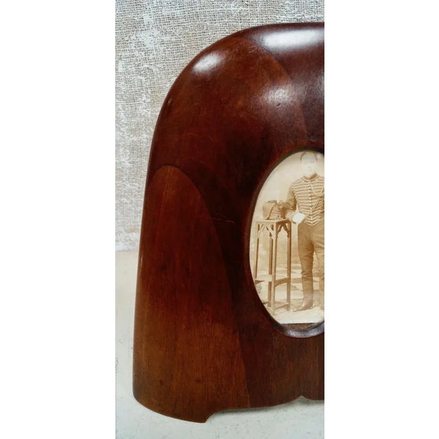 A Beautiful WW1 Propeller Tip Photo Frame, made from hardwood, this charming piece of memorabilia (trench art?) rests on a...