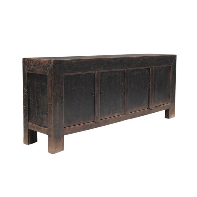 This vintage sideboard is made from reclaimed solid wood featuring weathered, dark charcoal brown finish with rustic...