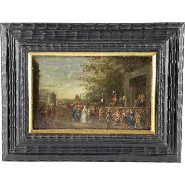 An Old Flemish painting from 1600, executed in oil on copper plate, depicting a glimpse of a landscape with figures, a...