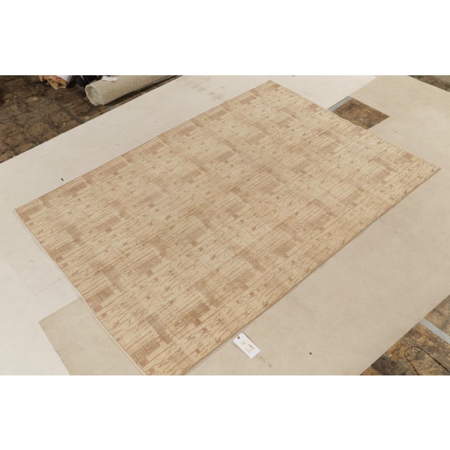 Hand knotted in wool, 7x 9 distressed style rug from our Mid Century Pasha collection commemorating the works of a bold...