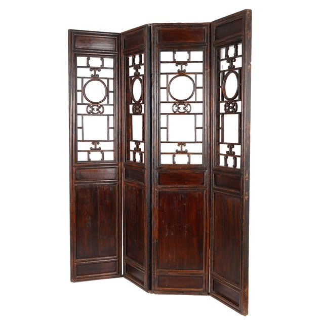 Four hardwood panel & lattice-work passage screens. The surfaces retain their original patinated finish. Panels have been...