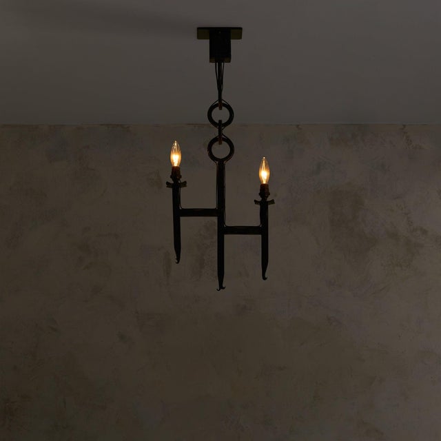 An embodiment of brutalist design, this French iron pendant dates back to the 1960s. Crafted from solid iron with a...