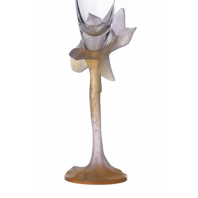 CUP, DAUM Category Glass and Crystal Flute in crystal with a molded and embossed paste base, decorated in acid, signed...