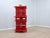 This italian modular bookshelf from the 1960s is crafted from solid wood with a glossy red lacquer finish and adjustable...