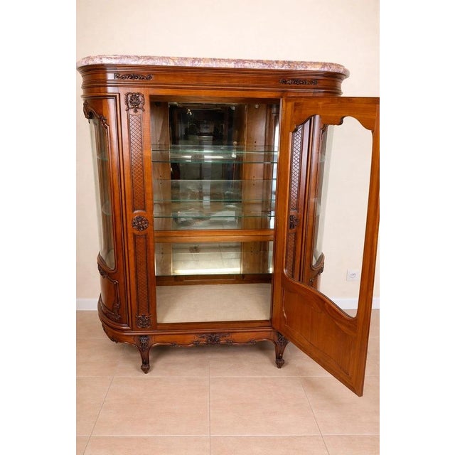 Provençal louis xv style cherrywood bookcase, circa 1930 an elegant provençal louis xv style cherrywood bookcase dating...