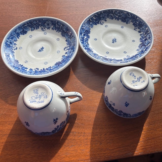 Royal Delft Teacups and Saucers dated 1965 and 1962. These were all painted by hand in the Royal Delft factory in Holland....