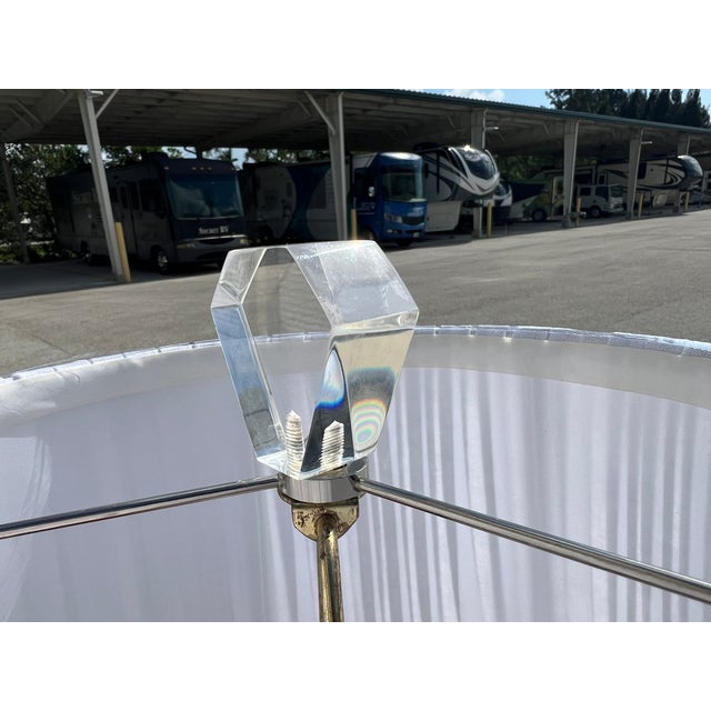 Impressive pair of stacked Lucite lamps, in the style of Karl Springer, 1980s. shades Included These are of the highest...