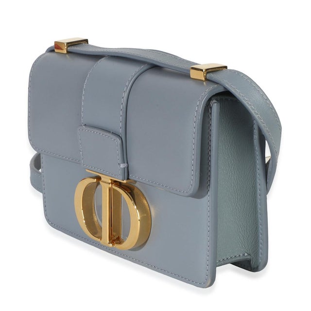 Item #: 153440 Features Interior: Single card slot Dimensions: 6 x 4 x 1.5 in Handbag Closure Type: Push Lock Strap...