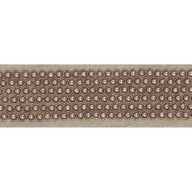 With pearl-like beading accented by hand-stitched metallic thread this tape delivers a sumptuously polished finishing...