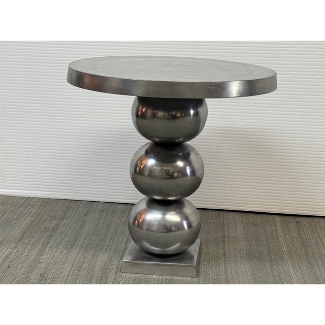 Design Plus Gallery presents a Sculptural Stacked-Sphere Metal Side Table. This contemporary table presents a round cast...