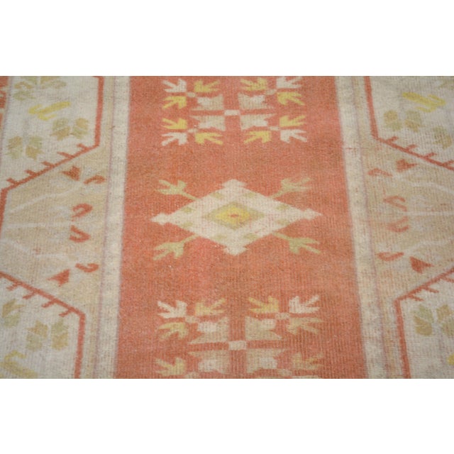 Hand-knotted with care using traditional rug making techniques, this wool rug blends timeless craftsmanship with a modern...