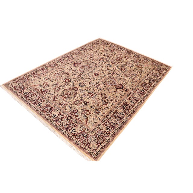 Designed with mesmerizing intricacy and gorgeous color palette, this hand-knotted masterpiece demonstrates the beauty and...