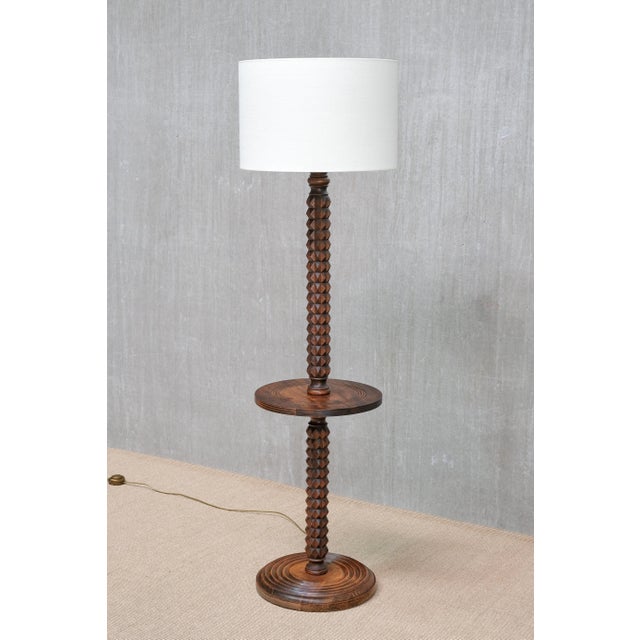 This rare floor lamp with integrated table was designed by charles dudouyt and produced in france in the late 1940s. Made...