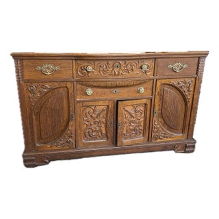 Antique Carved Oak Sideboard With Ornate Detailing For Sale