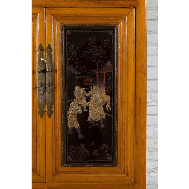 Brown Chinese Early 20th Century Lacquered Armoire With Gilt Carved Warrior Motifs For Sale - Image 8 of 18