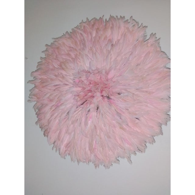 Juju hat light pink of 27" (70 cm). Juju hat made with natural feathers and rattan. Juju hat woven and handcrafted....