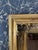 Statement-size vintage gilt wall mirror with an elegant, Old-World presence. The frame features beautifully sculpted...