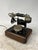 Beautiful rotary telephone made of wood and brass, ideal for collectors or as a decorative object to create a nostalgic...