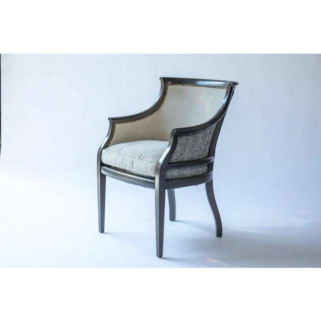 Completely reimagined mid-century lounge chair with nailhead trim. Frame has been refinished in a gray stain. Back of...