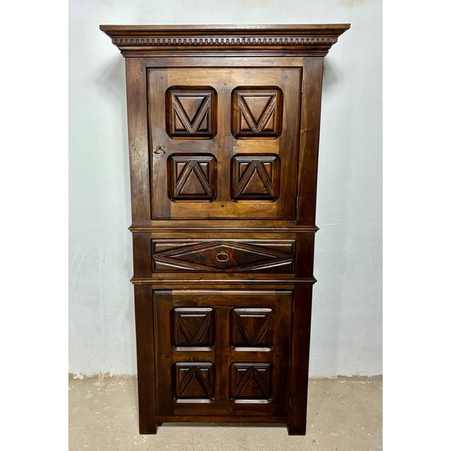 Striking Spanish cabinet from the early 20th century, crafted in solid walnut and inspired by traditional Renaissance...
