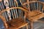 Pair of english 19th century windsor chairs with open fret splats with turned supports and legs with crinoline stretchers....
