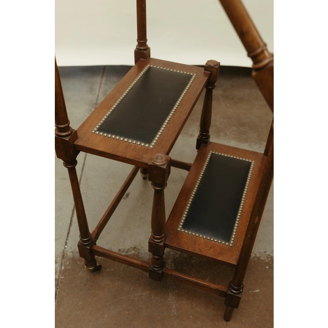 This vintage wood library step stand features a classic, functional design intended for library or study use. Crafted from...